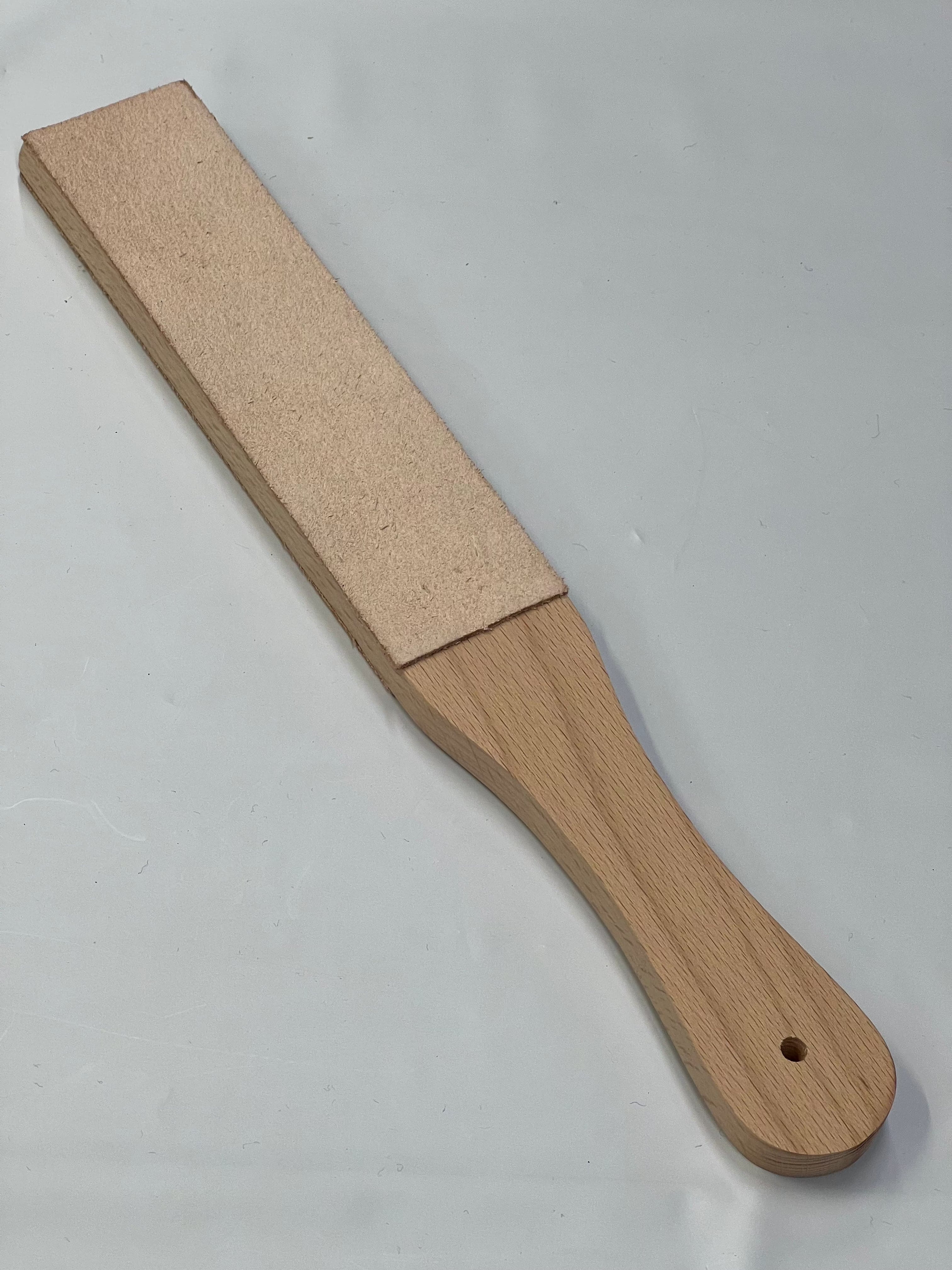 Double-sided leather strap on wooden base RW054