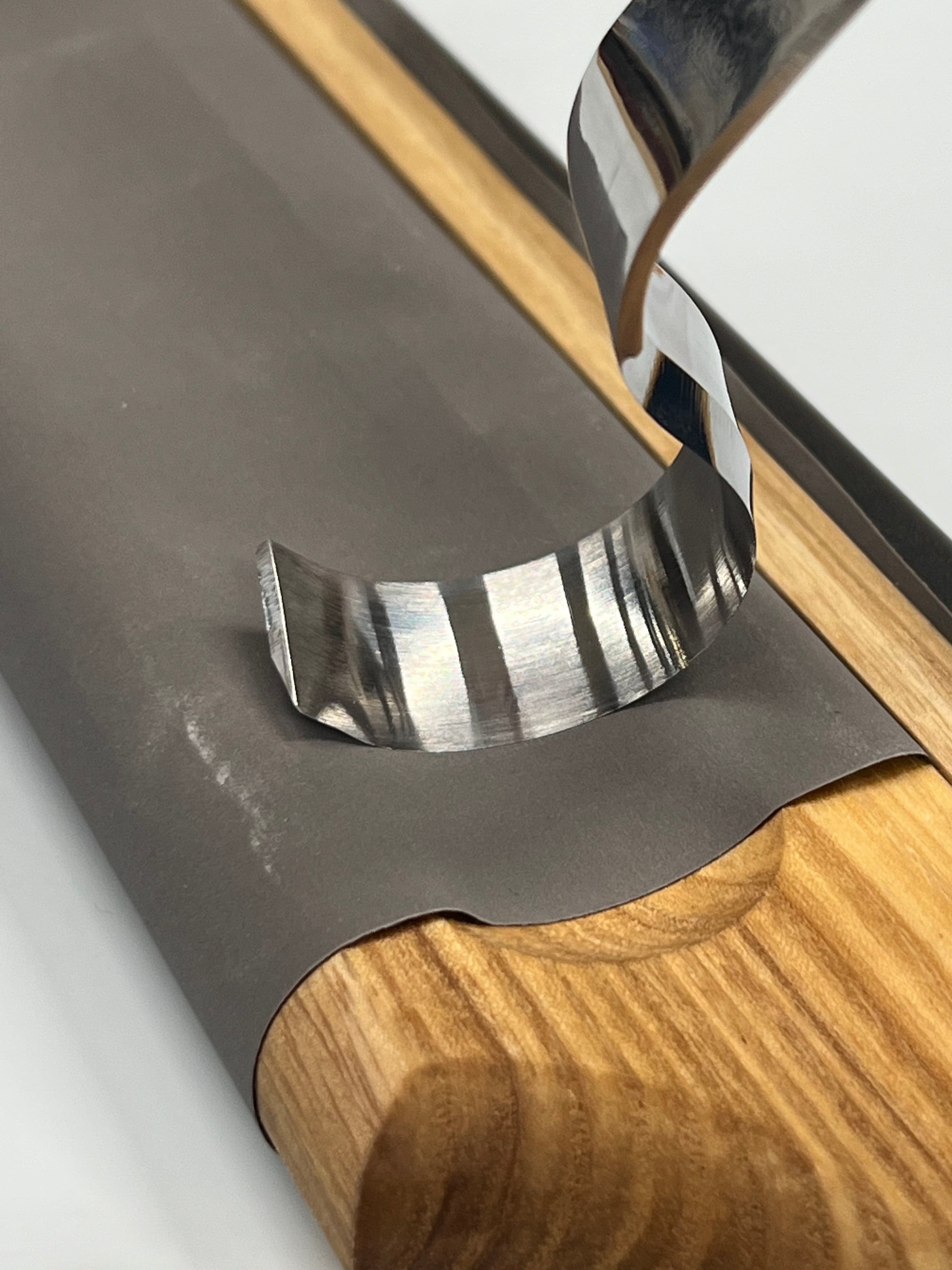 Leather strap for pocket knife and curved egg LS5P1