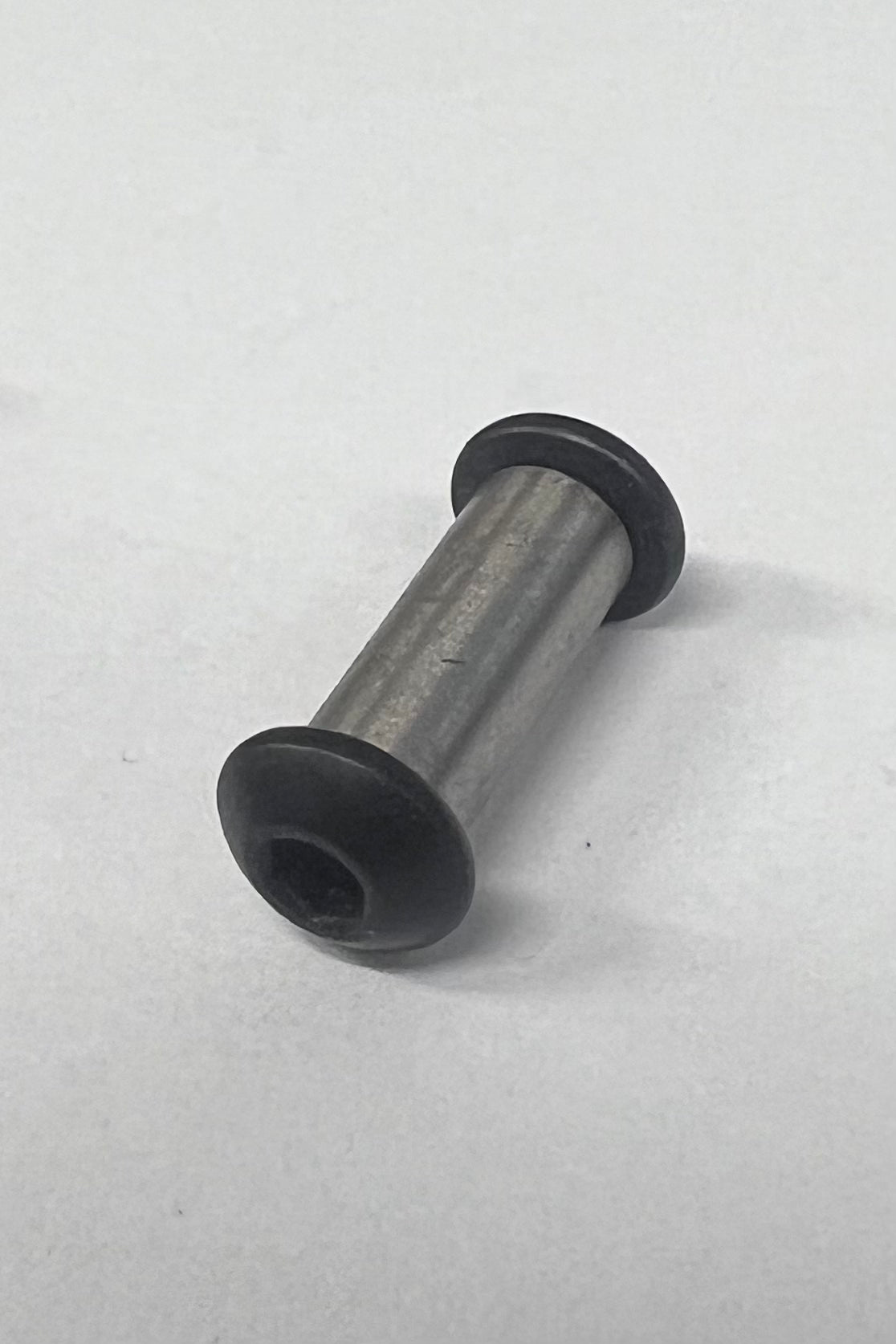 Screw to shaft - Small rounded screw