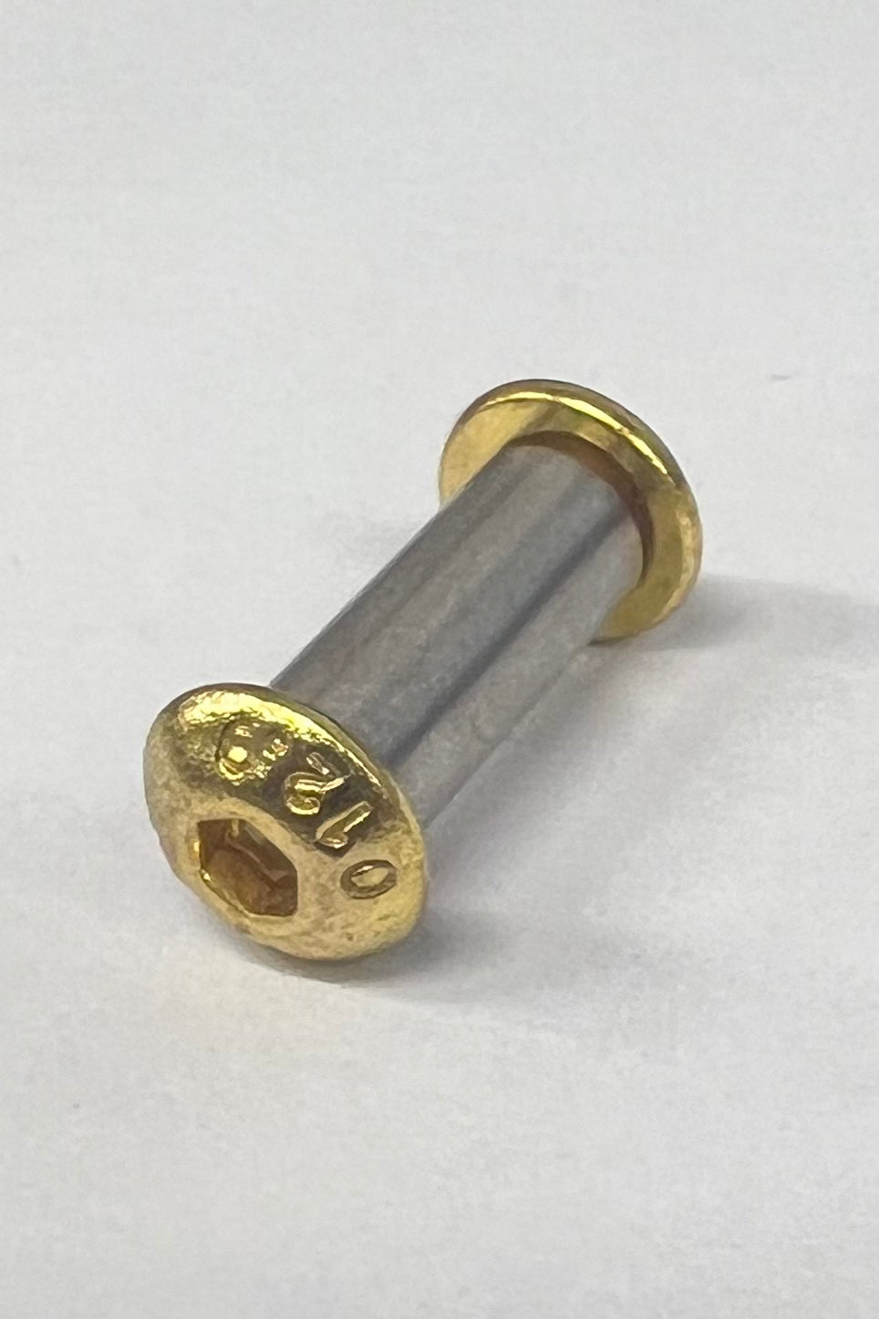 Screw to shaft - Small rounded screw